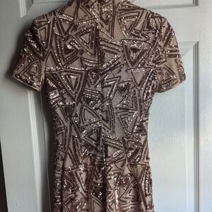 Forever 21 Mini sequels dress ,size s color rose gold .